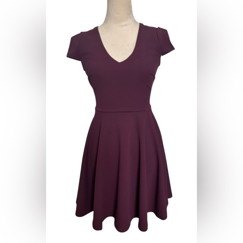 Women’s semi-formal dress. Size 1/2. Deep purple (almost burgundy). NEW!!!